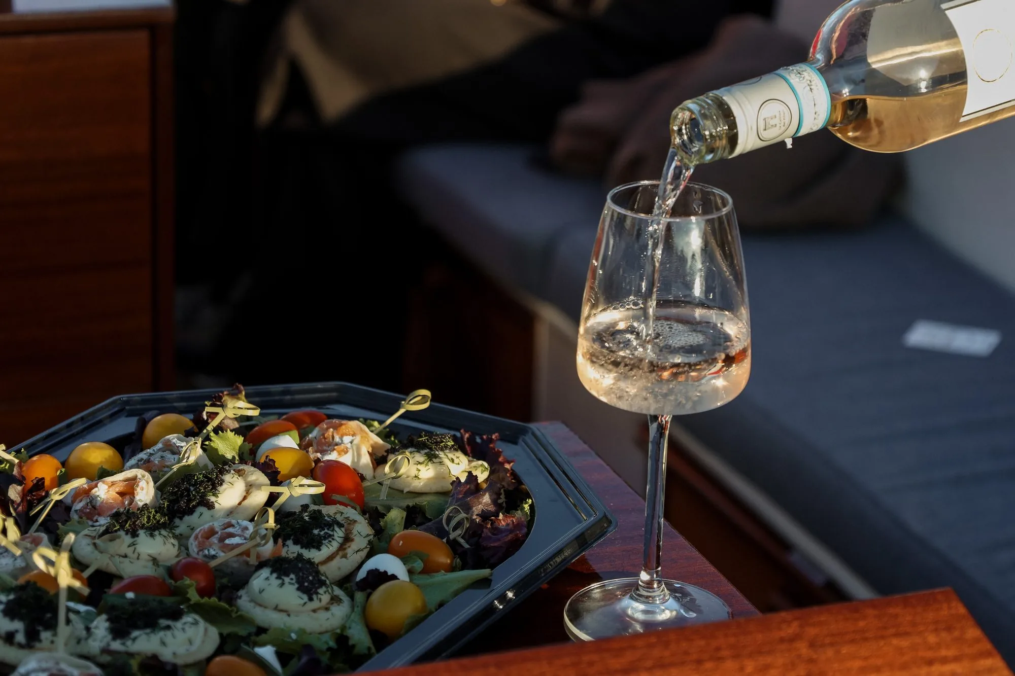 Wine tasting with a sharing board on board